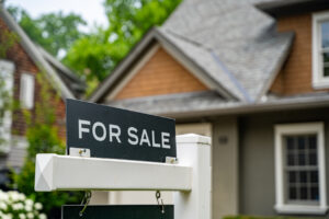 Generic for sale sign in front of a home